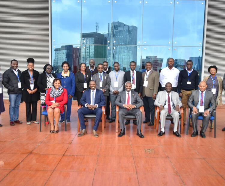 Dr. Kamau Gachigi (Seated 2nd Left), Chief Guest and Founding Executive Director, Gearbox Pan African Networks, pose for a group photo with presenters and participants after opening the Seminar. Also, in the photo is Prof Stephen Kiama (Seated Centre), UoN Vice-Chancellor, John Onyango (Seated 2nd Right), Institute's Acting Managing Director, Said Ramadhan (Right) of ARIPO and Prof. Mary Kinoti (Seated Left), Director, UoN's Intellectual Management Office of Research Innovation and Enterprise. 