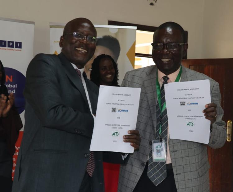 Photo Caption:  John Onyango (Left), Institute's MD, & Prof. Tom Ogada (Right), ACTS Executive Director, exchange documents after signing the MoU to set up a TISC